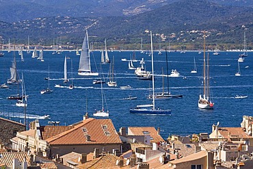 View over the roofs on the bay of Saint-Tropez during the sailing regatta "Les Voiles de Saint-Tropez" in Saint-Tropez, Departement Var, Cote d'Azur, Provence, Southern France, France