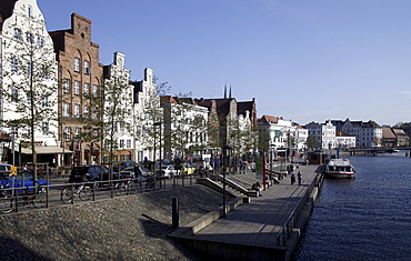 Hanseatic mansions and waterfront promenade at the Untertrave river, Hanseatic City of Luebeck, Schleswig-Holstein, Germany, Europe