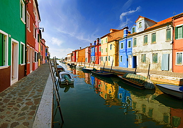 Panoramic view of the city and the colorfully painted houses and canals of Burano, Venice, Italy, Europe