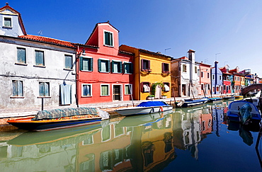 Panoramic view of the city and the colorfully painted houses and canals of Burano, Venice, Italy, Europe