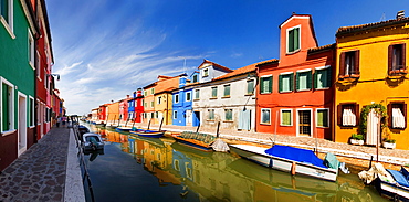 Panoramic view of the city and the colorfully painted houses and canals of Burano, Venice, Italy, Europe