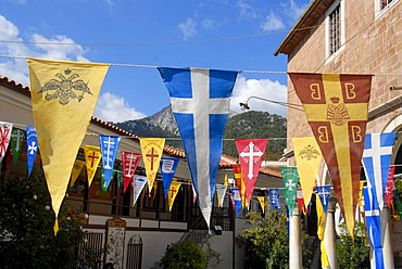 Greek Orthodox Christianity, colourful banners, pennants, on a church in the mountain village of Agiassos, Lesbos, Aegean Sea, Greece, Europe