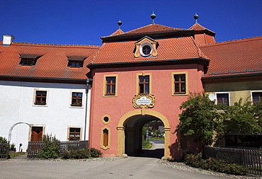 Northern gate of the monestarys courtyard at Speinshart monestary, abbey of the Premonstratensian order in Speinshart, Neustadt an der Waldnaab district, Upper Palatinate, Bavaria, Germany, Europe