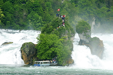 Commercial passenger boat at the Schaufelsen Rocks at the Rhine Falls, Neuhausen, Schaffhausen, Switzerland, Europe