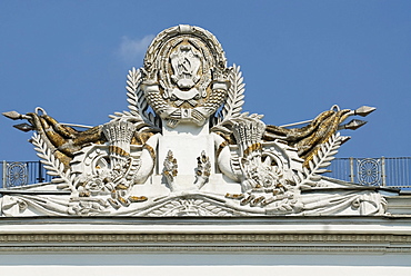 Arms of Soviet Russian Federation on top of the building on the territory of the VVTs or VDNKh, All Russian Exhibition Centre, Moscow, Russia