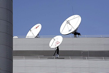 Satellite dishes on the roof of the headquarters and broadcasting centre of the RTL Group, Radio Television Luxembourg, in Luxembourg, Europe