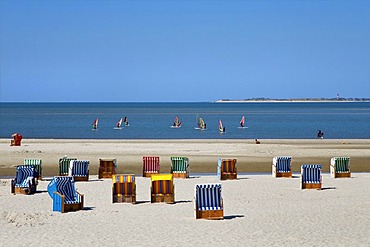 Roofed wicker beach chairs on the beach, Norddorf, Amrum, North Frisia, Schleswig-Holstein, Germany