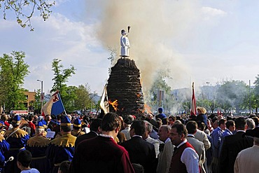 The Boeoeg, a doll symbolizing winter, is burned at the Sechselaeuten, traditional festival; the various guilds stand and ride around the fire, Zurich, Switzerland, Europe