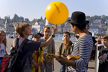 Street entertainer with children, Lucerne, Switzerland