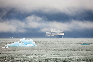 Cruise ship and iceberg, Inside Passage, Alaska, USA, North America