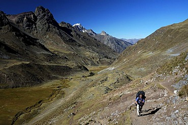 Hiker in the Cordillera Huayhuash, Peru, South America