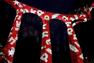 Irrigation water viaduct lit up with the motif 'Viaduct' to celebrate the acceptance of the "Rhaetische Bahn Railway in Albula/Bernina" as a UNESCO World Heritage Site, Filisur, Graubuenden, Switzerland, Europe