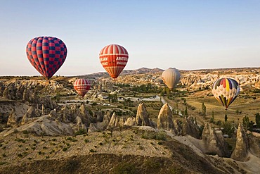 Hot air balloons over Cappadocia, Central Anatolia, Turkey, Asia