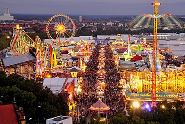 Evening view over the Oktoberfest from St. Paul's Church, Munich, Bavaria, Germany, Europe