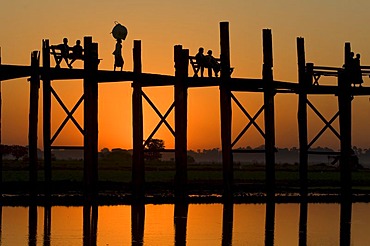 U Bein Bridge at sunset, Thaungthaman lake, Amarapura, Burma, Myanmar, South East Asia