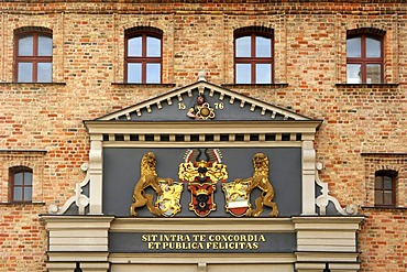 Stone portal of medieval City Fortification, aedicula with inscription and coat of arms above portal way through, Hanseatic City of Rostock, Mecklenburg-Western Pomerania, Germany, Europe