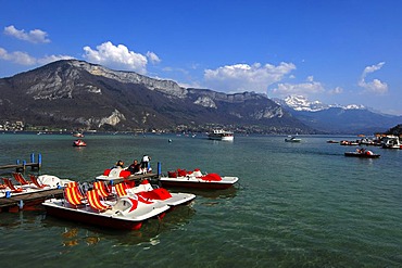 Beginning of the season for paddleboats, early spring day at Annecy Lake, Savoyen, France, Europe