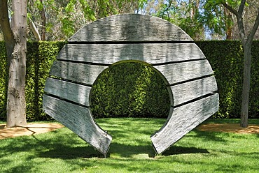 Wooden sculpture in the park of the New House of Parliament, Canberra, Australia