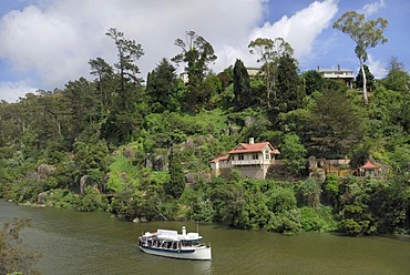 Built upon bank of the Esk River behind a sightseeing boat, Launceston, Tasmania, Australia