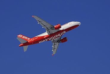 Commercial aircraft, Air Berlin, Airbus A319, climbing against a steel-blue sky, perspective from diagonally below, airberlin.com