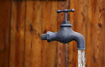 Water flowing from a tap