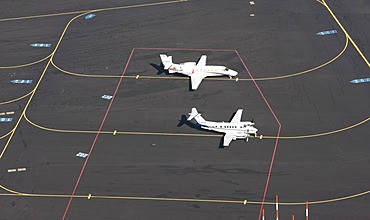 Planes for private and business trips on the apron, parking space of Muenster-Osnabrueck Airport, North Rhine-Westphalia, Germany, Europe