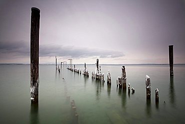 Old ice-covered boat landing near Uttwil on Lake Constance in Switzerland, Europe