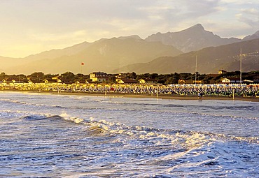 Beach of Forte dei Marmi, looking towards the Apennine Mountains at sunset, Tuscan Riviera, Versilia, Tuscany, Italy, Europe