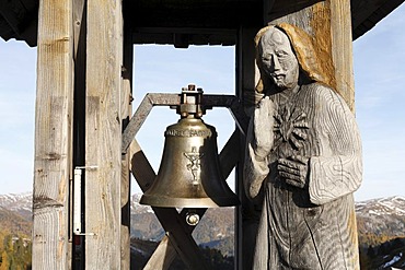 Wishing bell near Glockenhuette mountain on Nockalm Road, Nockberge National Park, Carinthia, Austria, Europe