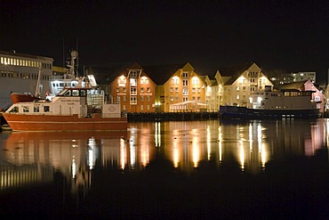 Warehouses of Tromso harbour, Skansen area, polar night, winter, Tromso, Troms, Norway