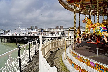 Carrousel, merry-go-round on the pier in Brighton, Sussex, Great Britain, Europe