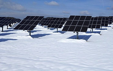 Big Photovoltaic system, solar plant, in snow, Oberruesselbach, Middle Franconia, Bavaria, Germany, Europe