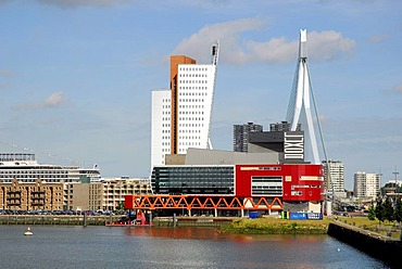 Modern architecture by the waterside: the red Luxor theatre, to the left of it the Belvedere building of the telephone company KPN Telecom and behind it the Erasmusbrug bridge, Wilhelminapier, Wilhelminaplein, Rijnhaven, Rotterdam, South Holland, the Neth