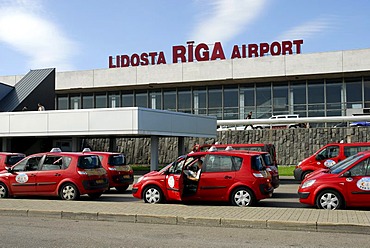 Red taxis in front of the Airport building, Lidosta Riga Airport, Riga, Latvia, Baltic States, Northeast Europe