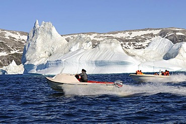 Boat tour with Inuit, icebergs near Ammassalik, East-Greenland, Greenland