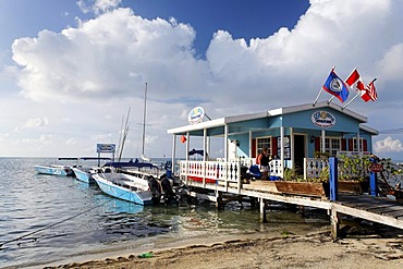 Restaurant on a pier in the ocean of San Pedro, Ambergris Cay Island, Belize, Central America, Caribbean