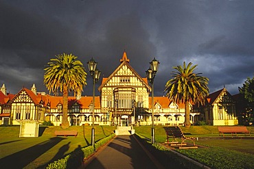 Bath House in the Government Gardens, today it hosts the Museum of Art and History, stormy atmosphere, Rotorua, North Island, New Zealand