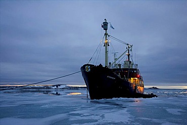 Research vessel anchoring in brash ice, Norway, Arctic