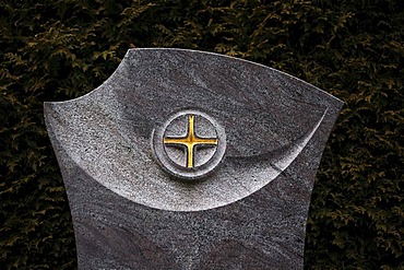 Masonry art work, cross on a gravestone