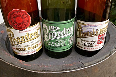 Old beer bottles of the Pilsner Brewery for the beer Pilsner Urquell, Pilsen, Plzen, Bohemia, Czech Republic, Europe.