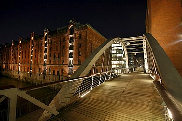 Speicherstadt historical warehouse district at night with the Sandbruecke bridge, Auf dem Sande, Hamburg, Germany