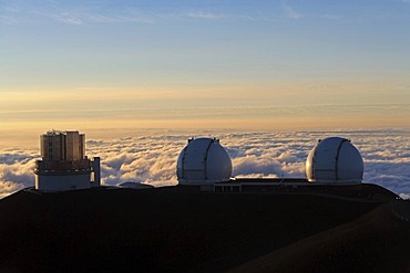 Domes of the Subaru Telescope and the two Keck Telescopes near the summit of the extinct volcano Mauna Kea, Hawaii, USA