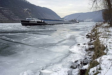 River barges stuck in ice on the river Mosel, near Oberfell, Rhineland-Palatinate, Germany, Europe