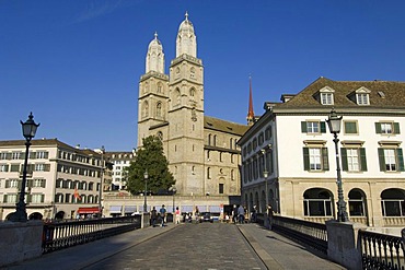 The Muensterbruecke Bridge in front of the twin towers of the Grossmuenster Church, the symbol of the city of Zurich, Switzerland, Europe