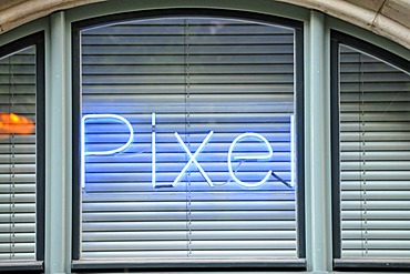 Neon signage in a window, Berlin, Germany, Europe