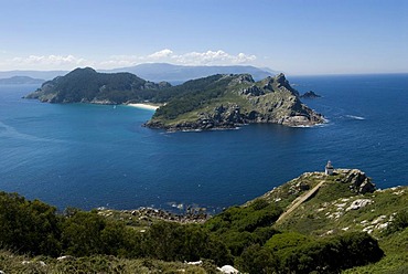 Lighthouse and view towards an island off Illas Cies, Spain, Europe