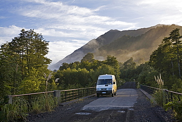 Camper on a bridge at Park Pumalin, Carretera Austral, Patagonia, Chile, South America