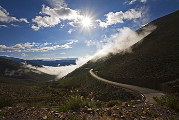 Pass road across the Andes through the clouds and fog, direction Jama pass (Paso de Jama), Argentina, South America