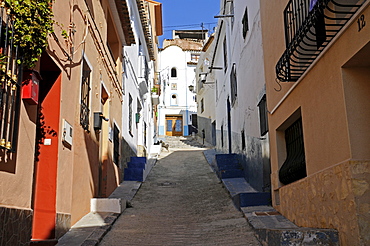 Steep uphill alley in the historic centre of Callosa d'en Sarria, Alicante, Costa Blanca, Spain