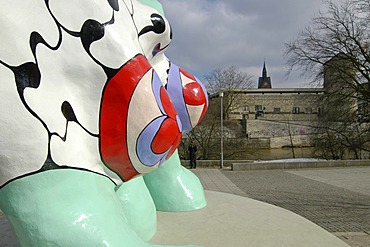 Hannover Niedersachsen Germany Nanas figurs of the artist Niki S. Phalle at the river Leine in front of the historic town